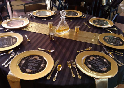 Black and gold table linens for art deco event