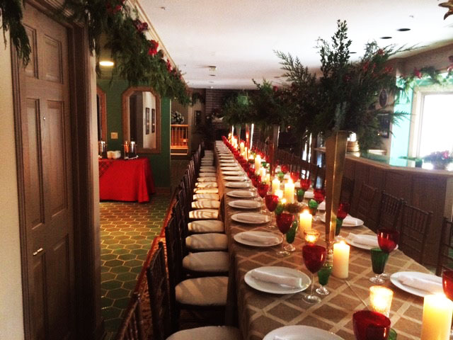 Neutral specialty linens with red and green glasses for holiday event